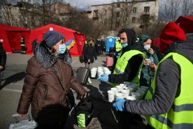 Olkusz, February 28, 2022. Ukrainian refugees after leaving the humanitarian train from Lviv at the PKP railway station in Olkusz, Poland. A campsite has been erected on site, medical assistance is provided and interpreters of the Ukrainian language are available. Later, the citizens of Ukraine will be transported by buses to the accommodation places indicated by the voivode. Photo PAP/ Łukasz Gągulski